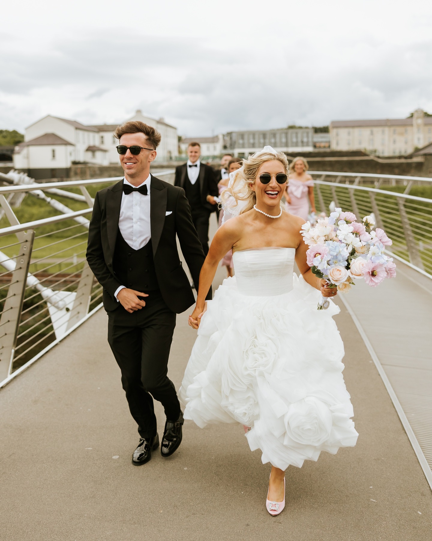Bride holding silk wedding bouquet